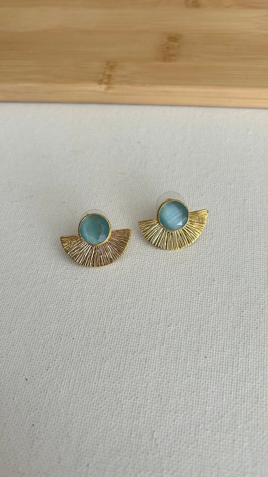 Aretes dorados topos