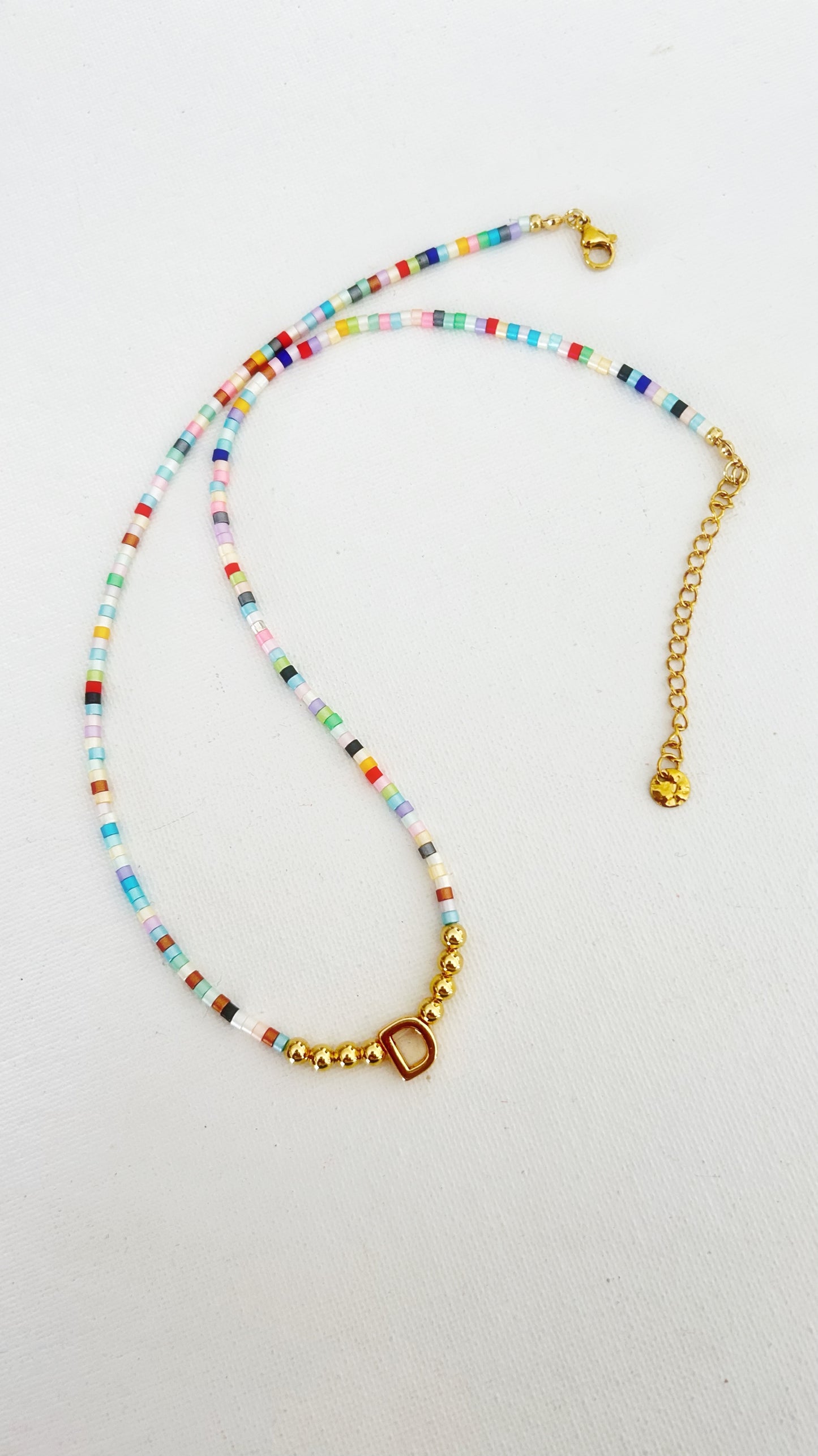 Gargantilla arcoiris letra