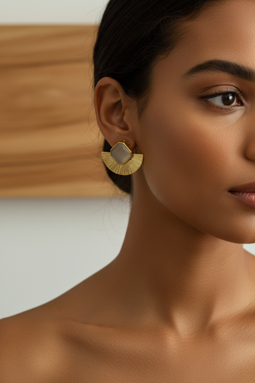Aretes dorados topos