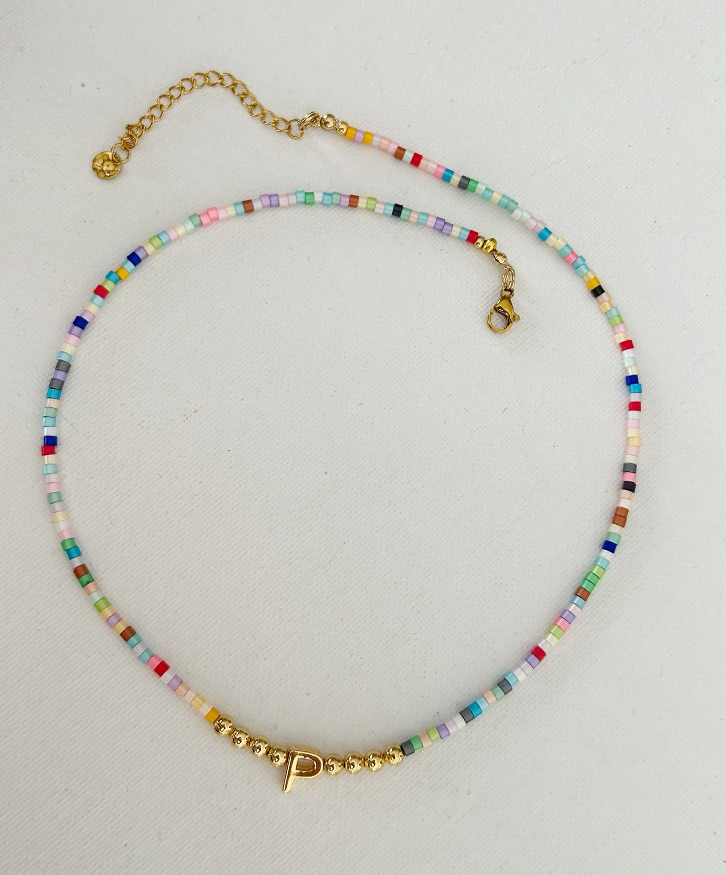 Gargantilla arcoiris letra