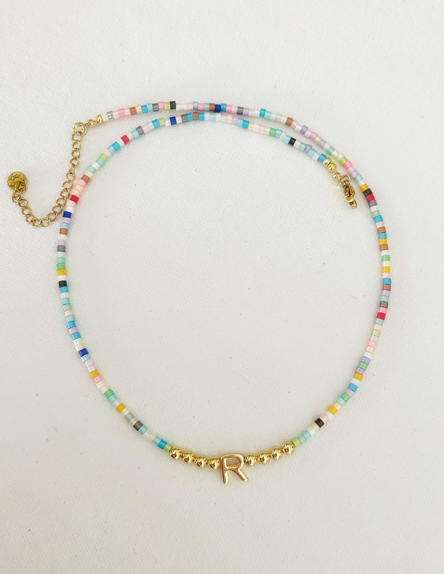 Gargantilla arcoiris letra