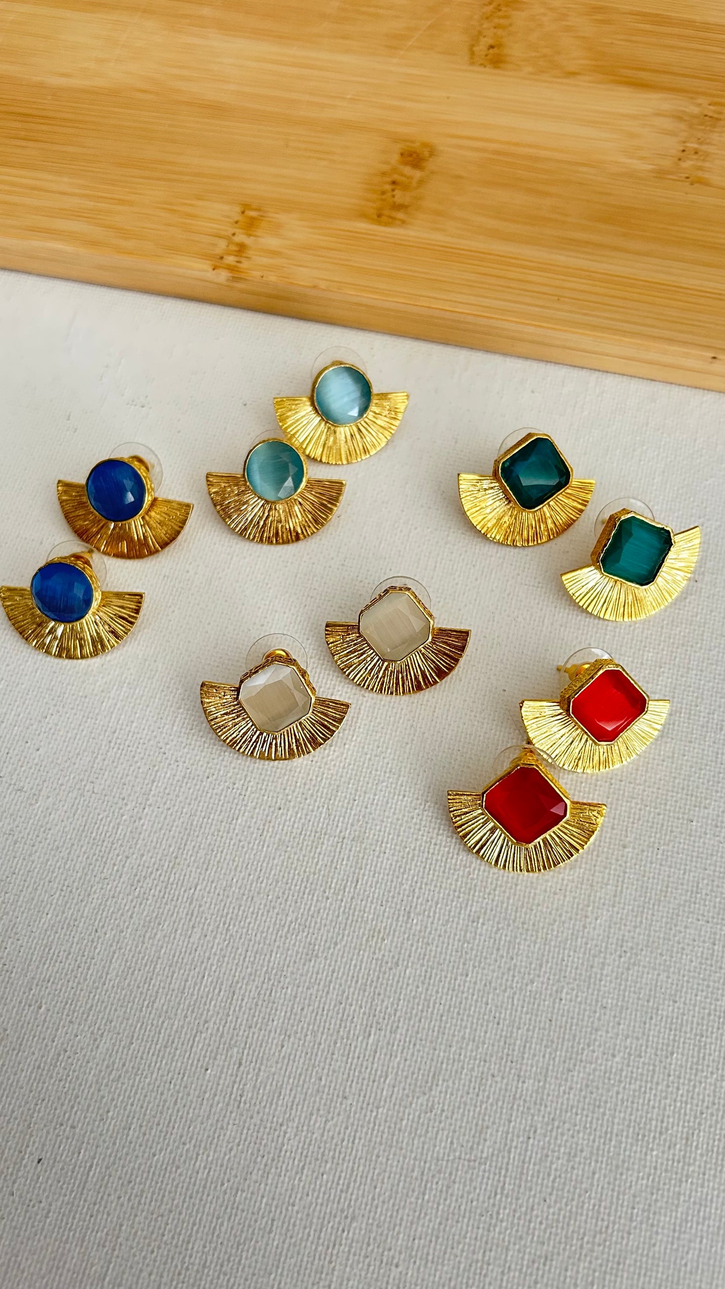 Aretes dorados topos