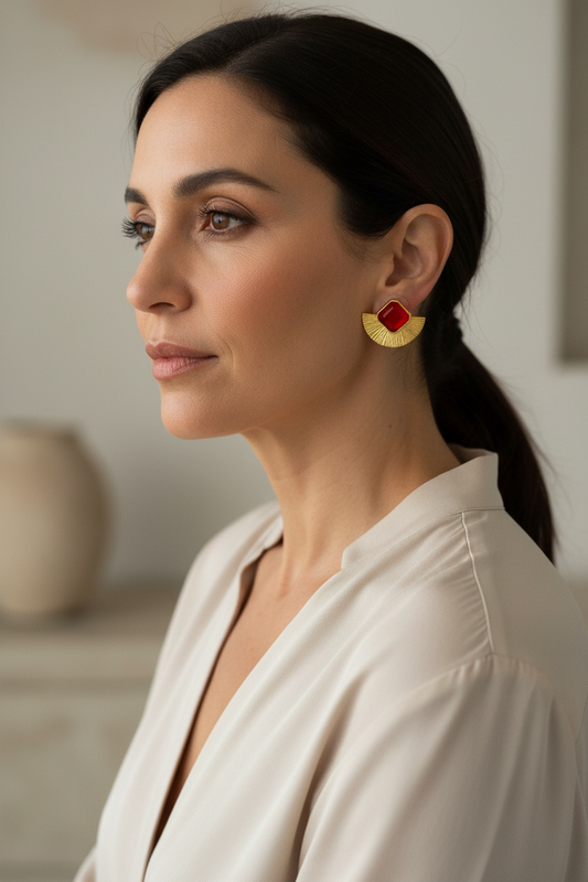 Aretes dorados topos